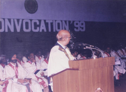 A member of the Senate/Board of Governors addresses the audience, 1999